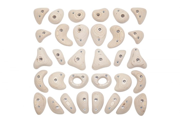 32 bolt on and screw on plywood climbing holds displayed symetrically